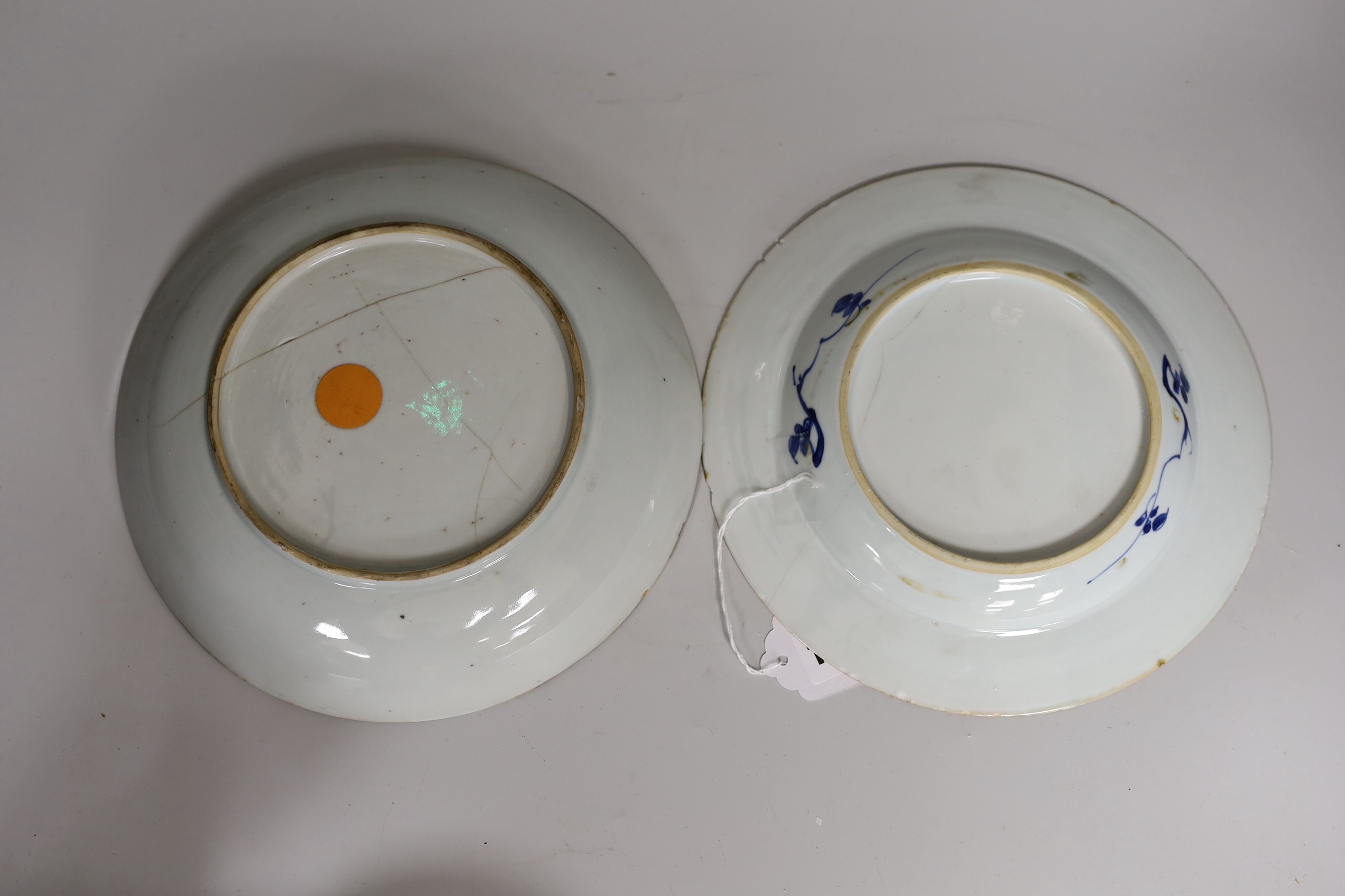 Three Chinese blue and white dishes and a bowl, together with an Imari vase. Largest 23cm diameter